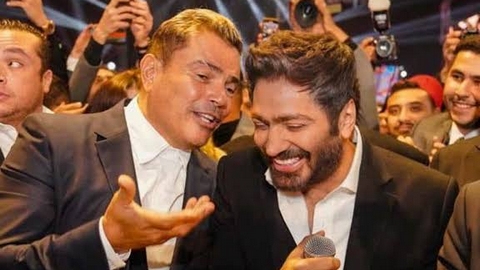تامر حسني مهاجماً عمرو دياب: أغنياتي فوق وهو في الأسفل!